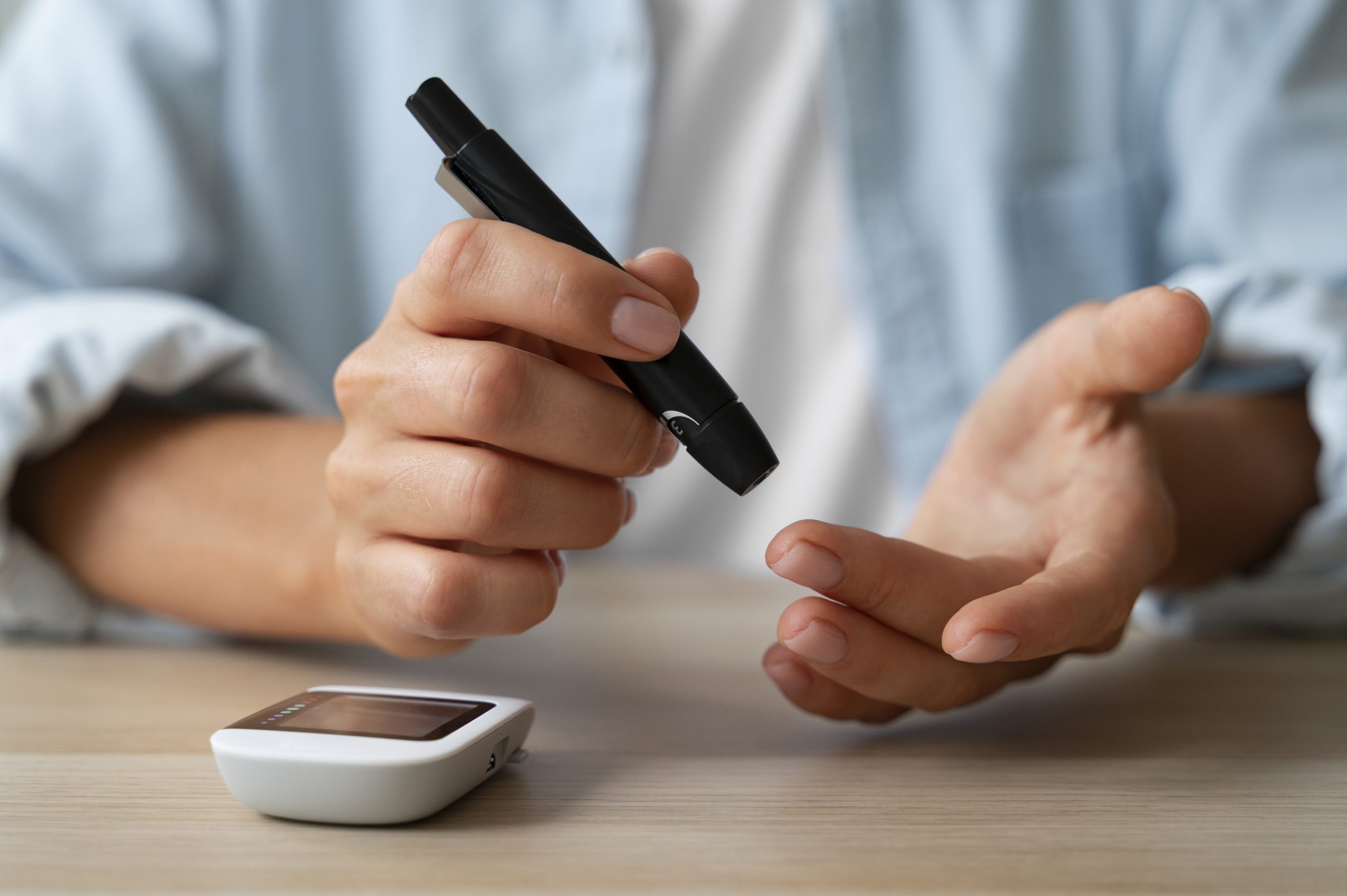 Man checking his blood sugar after a workout, illustrating why levels can rise after exercise and how to manage it.